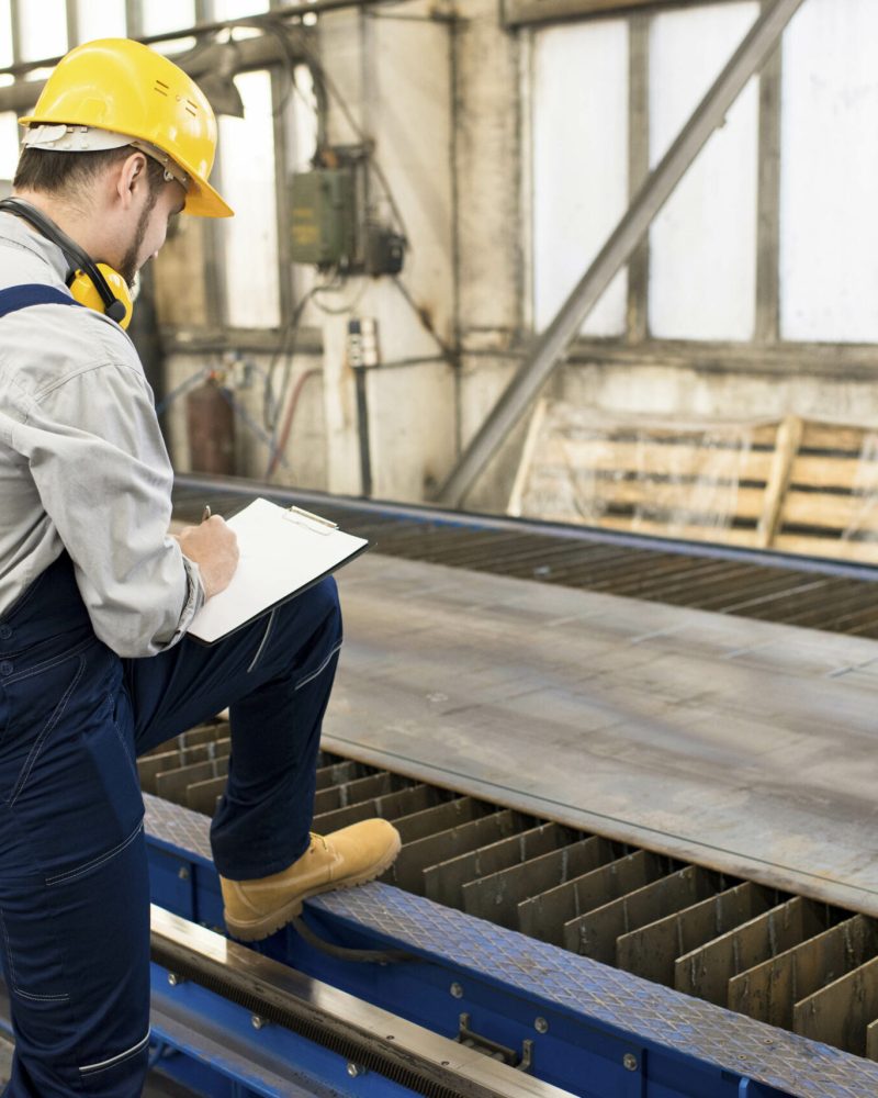 Engineer analyzing rolling mill